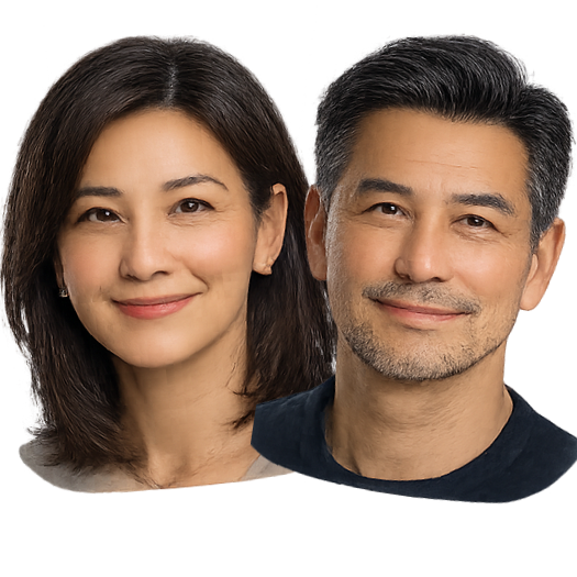 A parent and young child laughing together in warm natural light